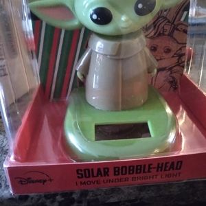 The mandalorian /Grogu/ Baby yoda bobble head star wars